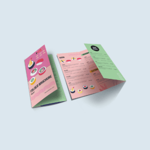 Sushi restaurant folded menu brochure mockup with a pink and green design, displaying sushi illustrations, menu items, and pricing details.