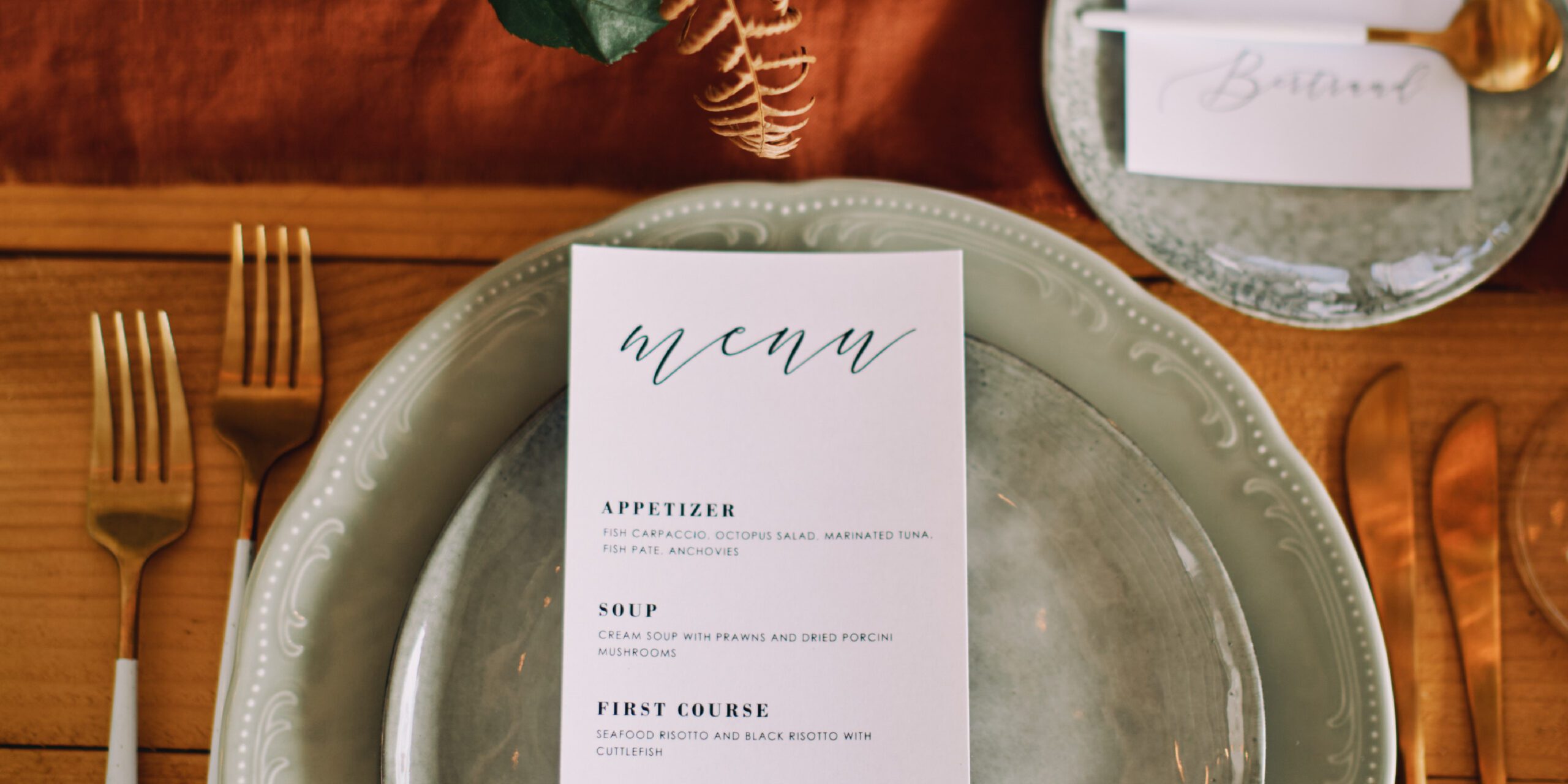 printed wedding reception name placeholder and menu for a hospitality wedding venue